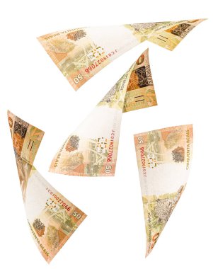 Brezilya 'dan gelen 50 reais banknot izole edilmiş beyaz arka plana düşüyor. Servet kavramı, ödül, büyük şans veya yatırım.