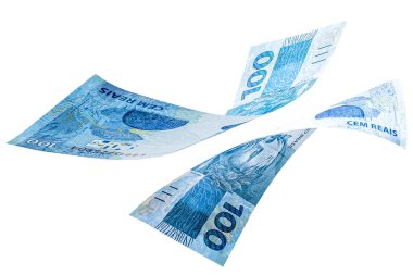 Brezilya 'dan gelen 100 reais' in banknotları izole edilmiş beyaz arka plana düşüyor. Brezilya para biriminin düşüşü, devalüasyon, ekonomik kriz.