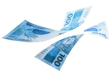 Brezilya 'dan gelen 100 reais' in banknotları izole edilmiş beyaz arka plana düşüyor. Brezilya para biriminin düşüşü, devalüasyon, ekonomik kriz.
