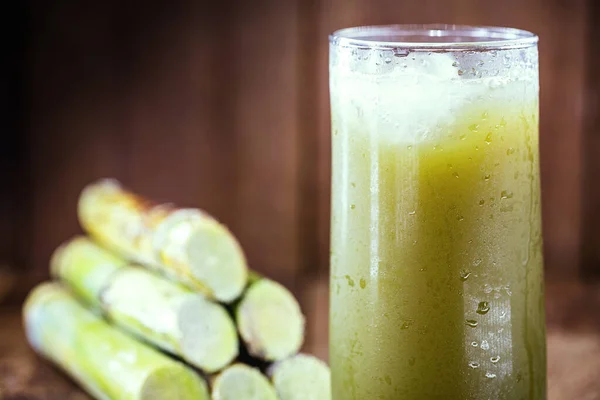 Sugar cane juice or garapa is the liquid extracted from sugar cane in the milling process. Typical drink from Brazil. organic and natural.