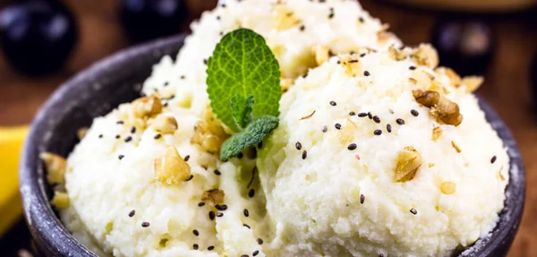 gourmet Brazilian banana ice cream, with organic, natural fruit decorated with mint.