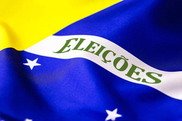 Word: ELECTIONS written in Portuguese, on the flag of Brazil. Concept of municipal elections in Brazil in November, to municipal mayors
