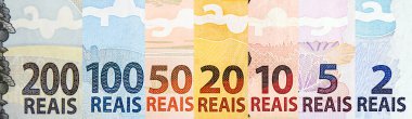 Brezilya 'nın para banknotları, birleşik olarak. 200, 100, 50, 20, 10, 5 ve 2 reais 'in detayları. Brezilya ekonomisi konsepti, yeni 200 reais detay