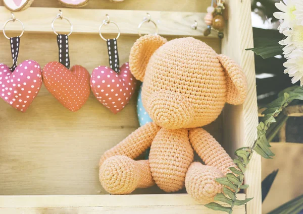 Lovely crocheting or kniting, orange bear for romantic valentine