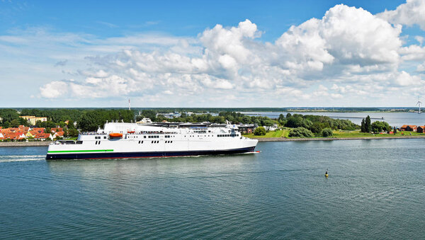 Modern ferry enters the port of Rostock. The ferry line connects the German port of Rostock with Gedser in Denmark