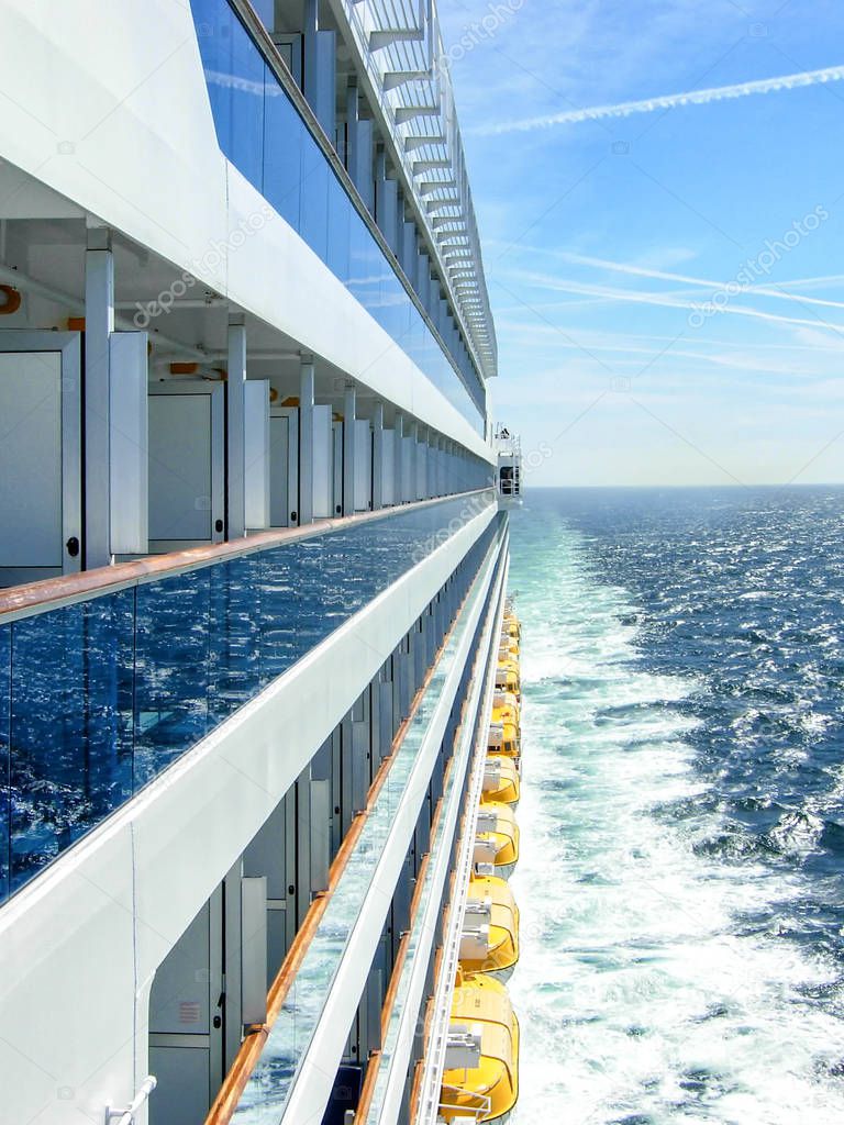 Exterior view of a cruise ship during the voyage on the sea 