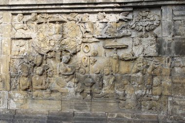 Güzel kısma duvar dekorasyonu Borobudur Tapınağı, Yogyakarta, Endonezya taşa oyulmuş 