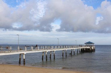 A jetty and dramatic clouds at Tioman Island, Malaysia