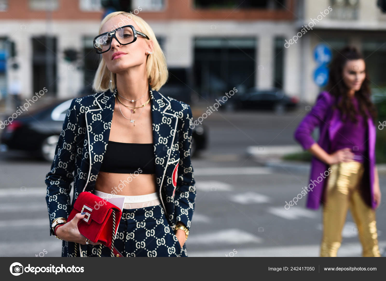 Woman with Green Dress and Louis Vuitton Bag before Alberta Ferretti  Fashion Show, Milan Editorial Photo - Image of outfit, sunlight: 197692921