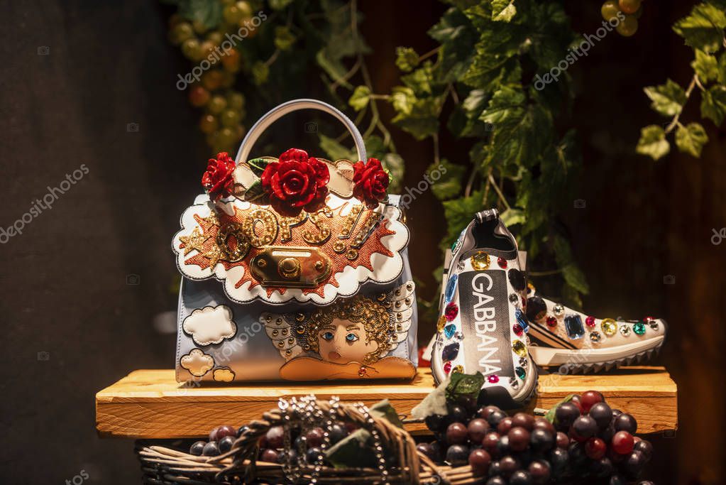 September 22, 2018: Milan, Italy -  Luxury Dolce Gabbana shoes and handbag in a store in Milan