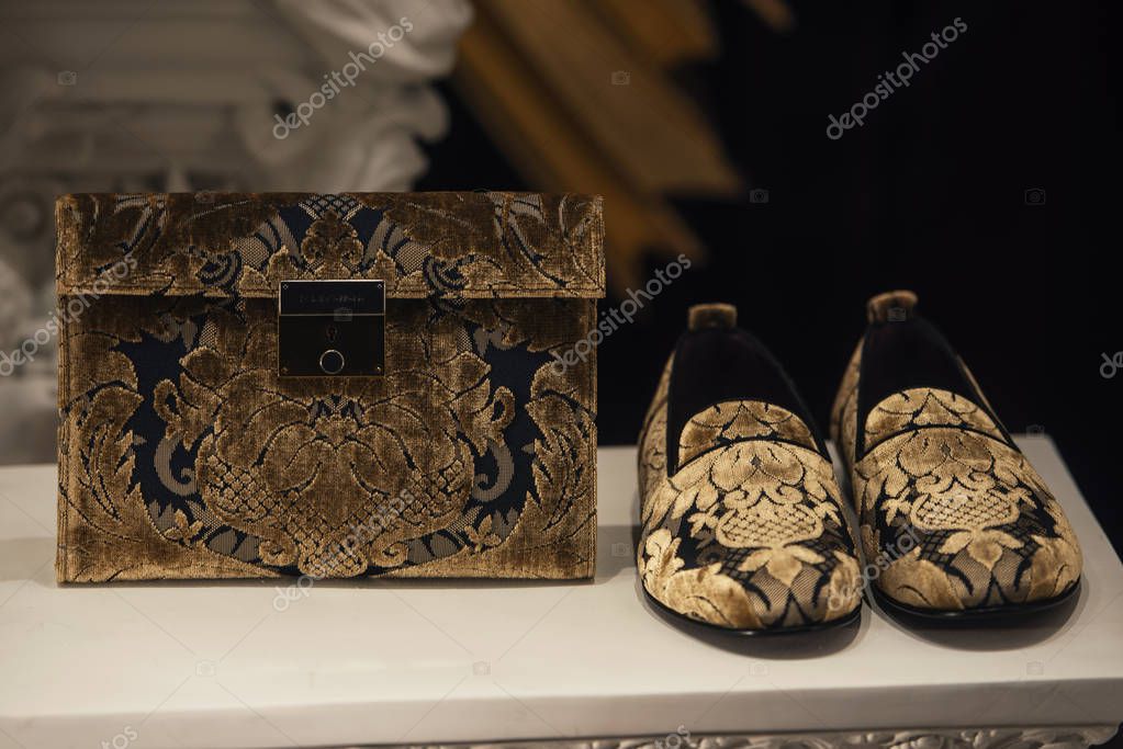 September 22, 2018: Milan, Italy -  Luxury Dolce Gabbana shoes and handbag in a store in Milan