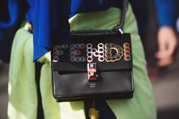 September 28, 2018: Paris, France - Girl wearing a stylish Fendi hand bag after a fashion show during Paris Fashion Week  - PFWSS19
