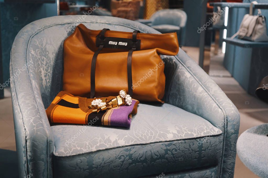 Milan, Italy - February 24, 2018: Bags and accessories in a Miu Miu store in Milan.
