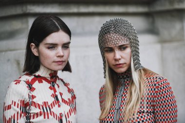 Paris, France - February 28, 2019: Street style outfit -  Reese Blutstein, Courtney Trop before a fashion show during Paris Fashion Week - PFWFW19 clipart