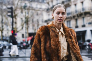 Paris, France - March 02, 2019: Street style Street style outfit before a fashion show during Milan Fashion Week - PFWFW19;
