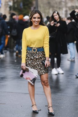 Paris, France - March 05, 2019: Street style appearance during Paris Fashion Week - PFWFW19 clipart