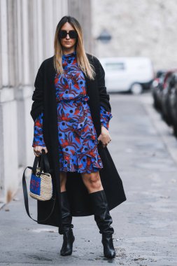 Paris, France - March 02, 2019: Street style Street style outfit before a fashion show during Milan Fashion Week - PFWFW19;