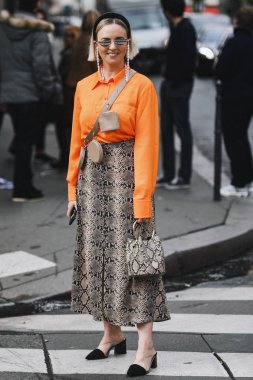 Paris, France - March 02, 2019: Street style Street style outfit before a fashion show during Milan Fashion Week - PFWFW19;