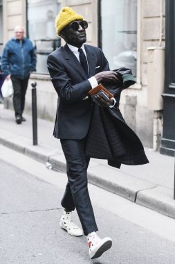 Paris, France - March 03, 2019: Street style appearance during Paris Fashion Week - PFWFW19