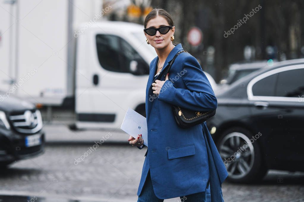 Paris, France - March 05, 2019: Street style outfit before a fashion show during Milan Fashion Week - PFWFW19