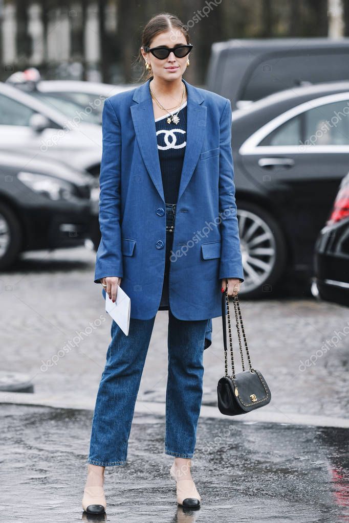 Paris, France - March 05, 2019: Street style outfit before a fashion show during Milan Fashion Week - PFWFW19