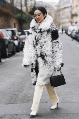 Paris, France - March 02, 2019: Street style outfit -  Yoyo Cao after a fashion show during Paris Fashion Week - PFWFW19
