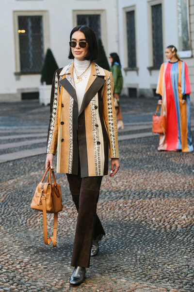 Milan, Italy - February 22, 2019: Street style Outfit before a fashion show during Milan Fashion Week MFWFW19