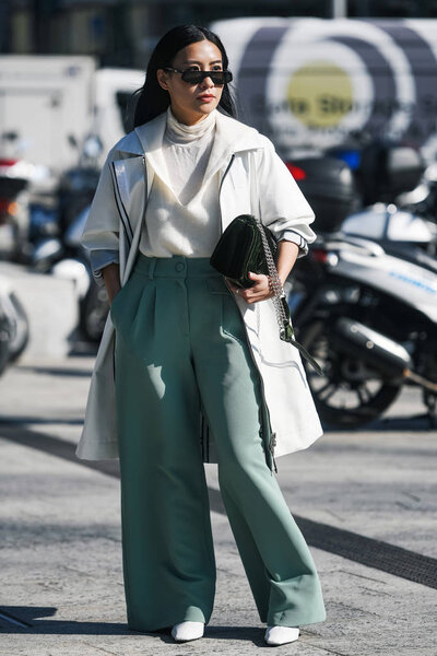 Milan, Italy - February 22, 2019: Street style Outfit after a fashion show during Milan Fashion Week - MFWFW19