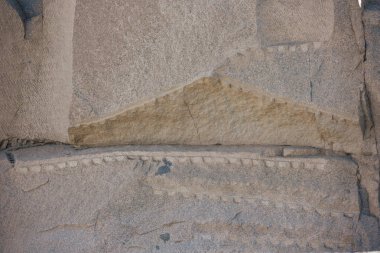 Detail of the cutting process of the unfinished obelisk of Aswan as part of a solid rock clipart