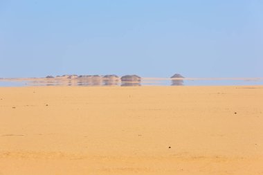 Looking at a mirage in the desert between Abu Simbel and Aswan clipart