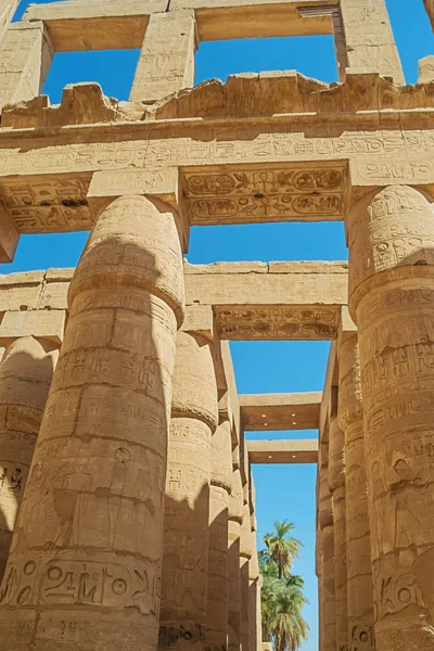 Looking at the top of the columns in the hypostyle hall in the Temple Complex of Karnak