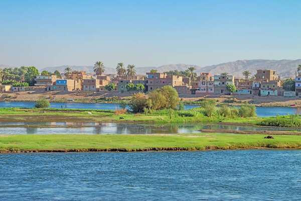 The village of Armant on the shore of the Nile, between Luxor and Aswan