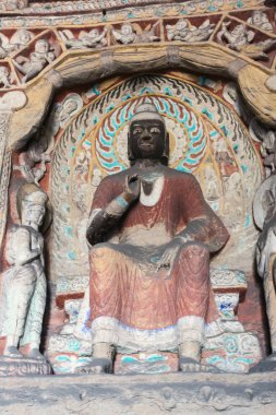 Datong yakınlarındaki Yungang Mağaraları mağara9 parlak renkli siyah Buda heykeli