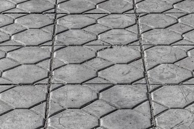 Gri beton döşeme levhalarının yüzeyi..