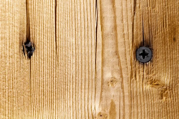 Zwei Schwarze Schrauben Werden Eine Holzplatte Geschraubt — Stockfoto