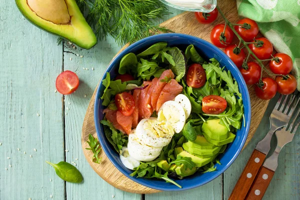 Diet menu, Vegan food. Healthy salad with arugula, Tomatoes, Sal