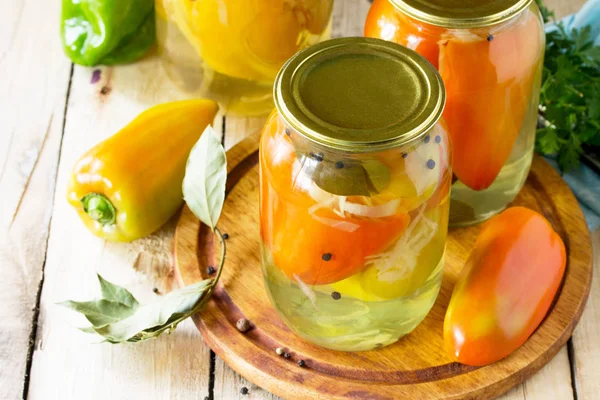 Homemade preserving. Bulgarian Pepper stuffed with vegetables in — Stock Photo, Image