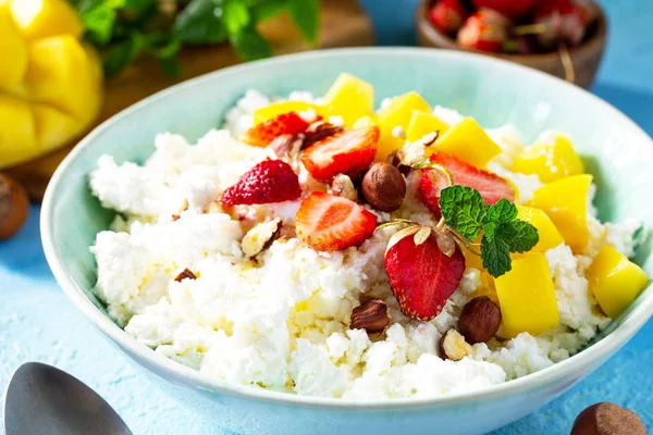 Dietary breakfast for summer time. Fresh cottage cheese close-up