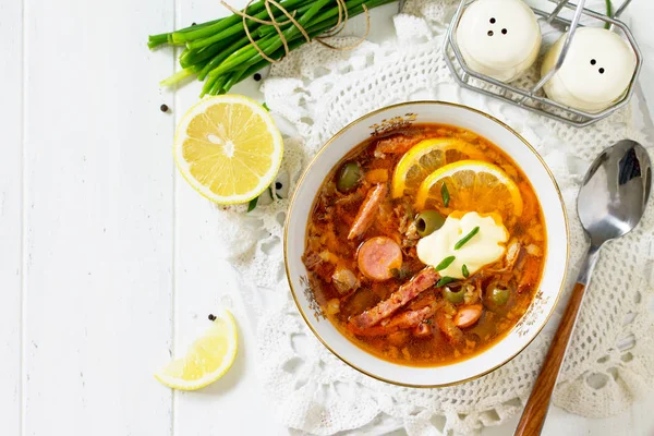 Traditional Russian soup Solyanka with meat, sausages, vegetable — Stock Image Traditional Russian soup Solyanka with meat, sausages, vegetable Stock Picture