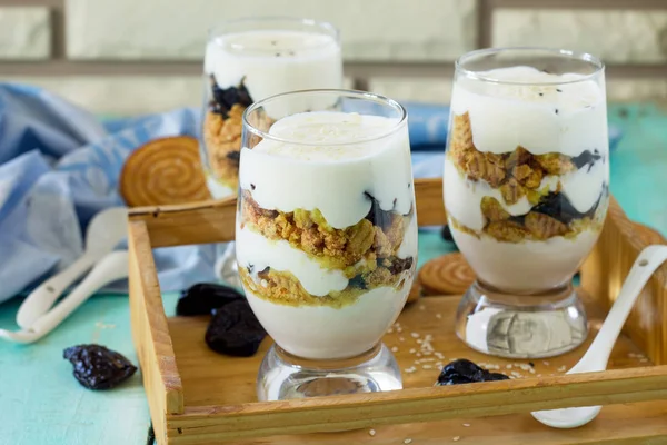 Vegan Dessert with whipped cream, nuts, oatmeal, prunes and sesa