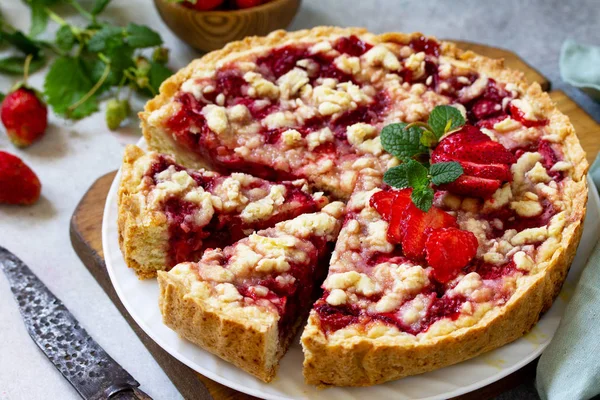 Delicious summer dessert strawberry pie with crumble, sweet deli