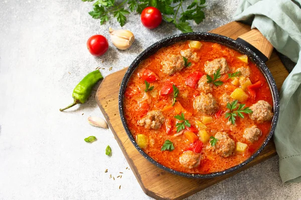 Spanish and Mexican food - Albondigas. Hot stew tomato soup with — Stock Image Spanish and Mexican food - Albondigas. Hot stew tomato soup with Stock Image