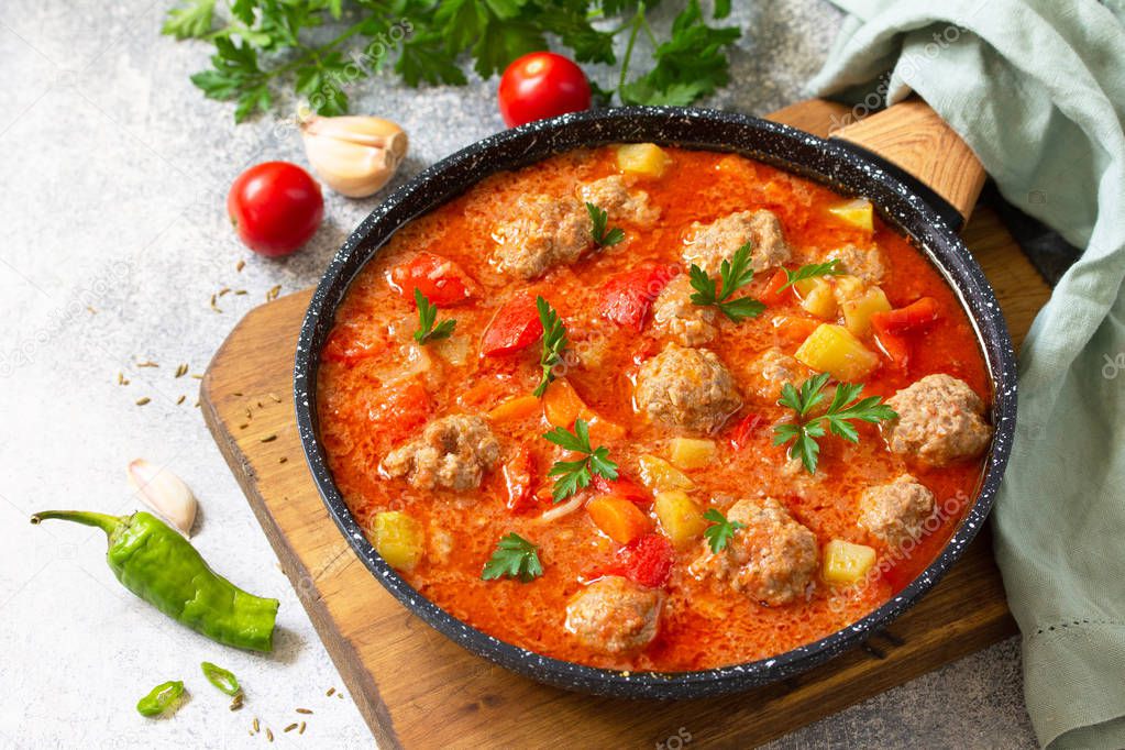 Spanish and Mexican food - Albondigas. Hot stew tomato soup with