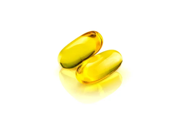 Fish oil soft gel supplement capsules source of omega and vitamins isolated on white background