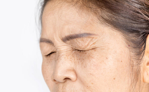 close up elderly asian woman face 60-70 years old which closing eyes, healthy skin care concept