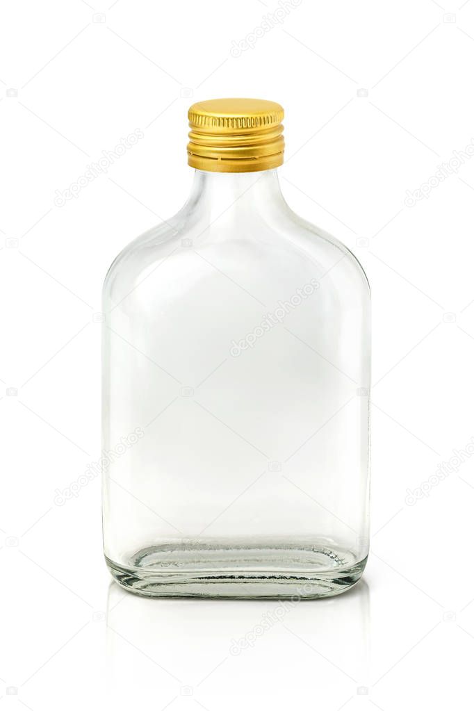 Clear glass bottle with brass cap isolated on white background