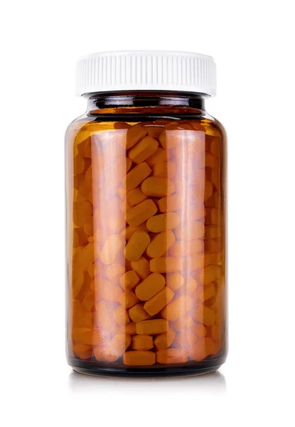Frasco de vidro castanho com vitamina ou suplemento e tampa branca — Fotografia de Stock