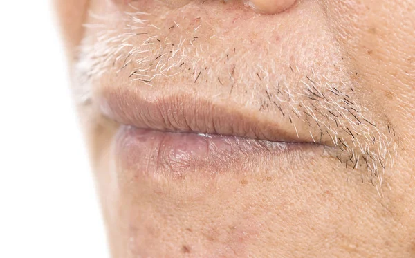 Close-up of elderly asian man mouth with wrinkle on face — Stock Photo, Image