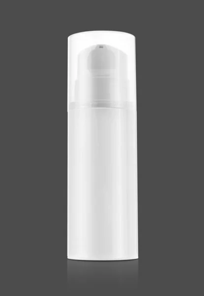 Пляшка насоса для вершків і лосьйону ізольована на сірому фоні — стокове фото