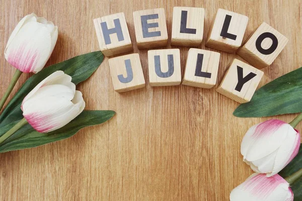 Hello July Artificial Flower Wooden Background — Stock Photo, Image